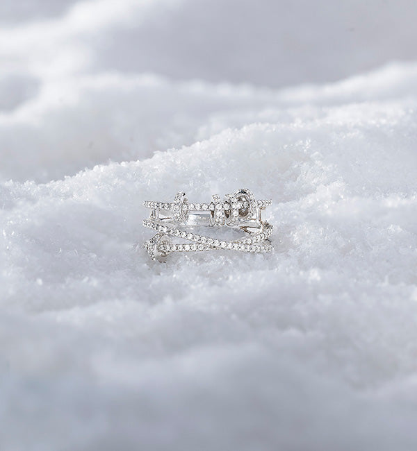 Silver ring from APM MONACO on a white background